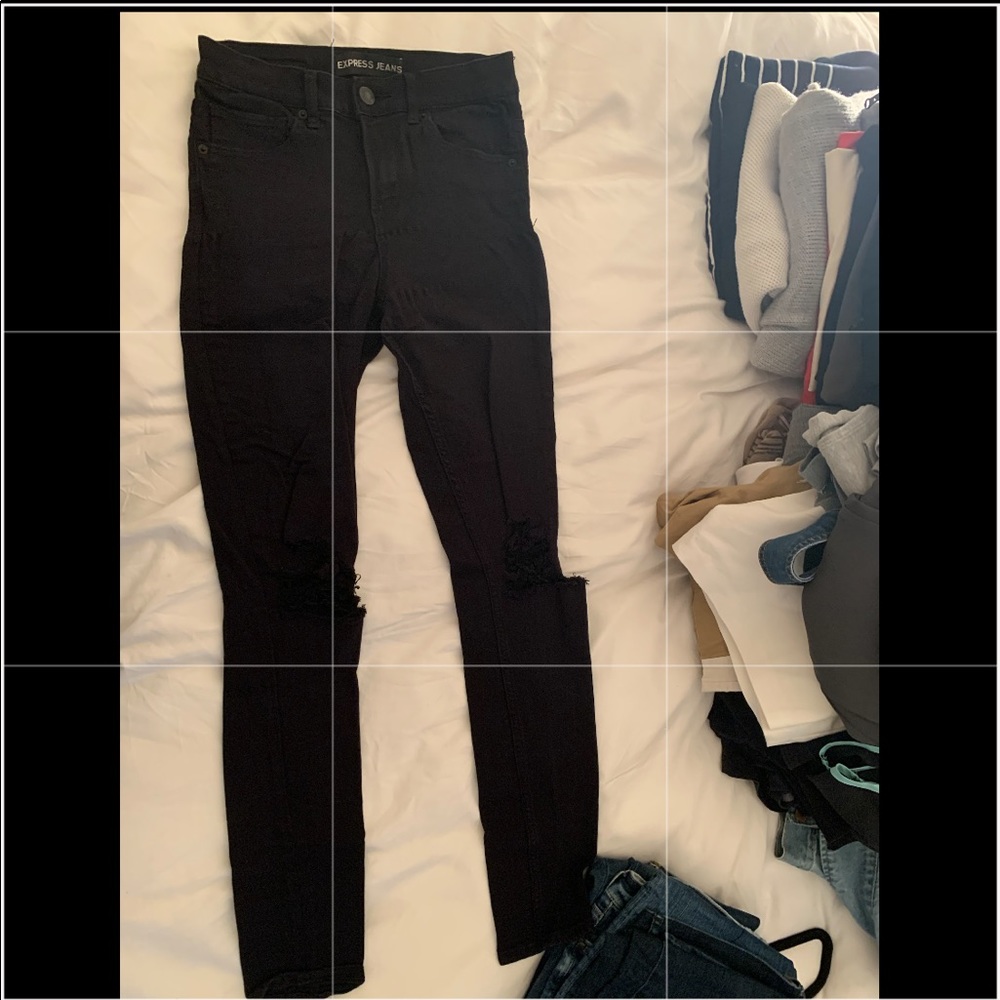 High waisted, ripped black jeans